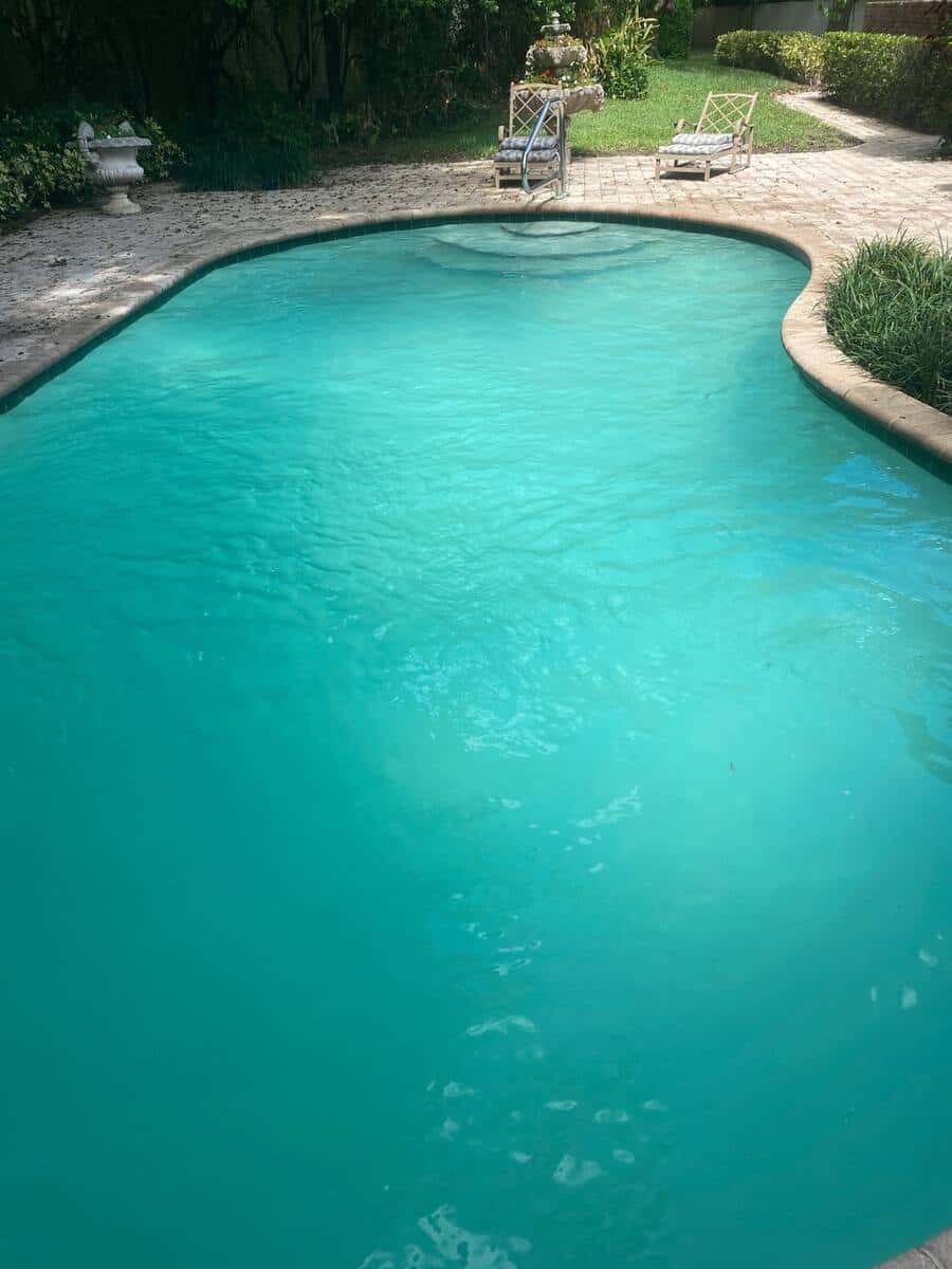 Crystal-clear pool after recovery — Boca West, post-storm