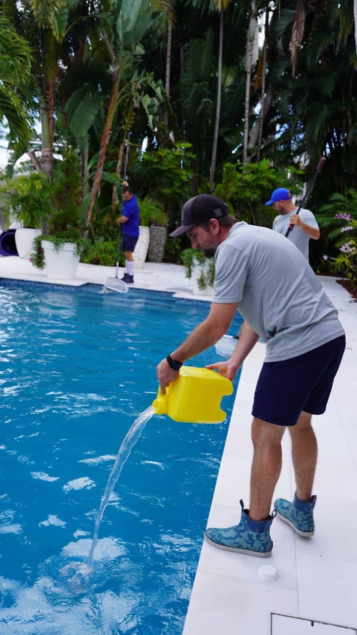 Pool chlorine and chemistry being measured and adjusted on a South Florida pool
