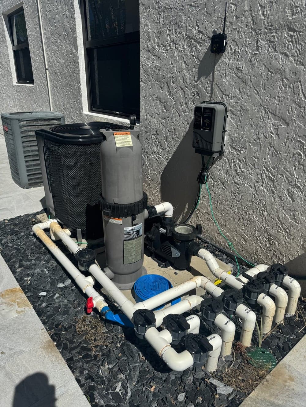 Pool equipment pad with pump, filter, heater